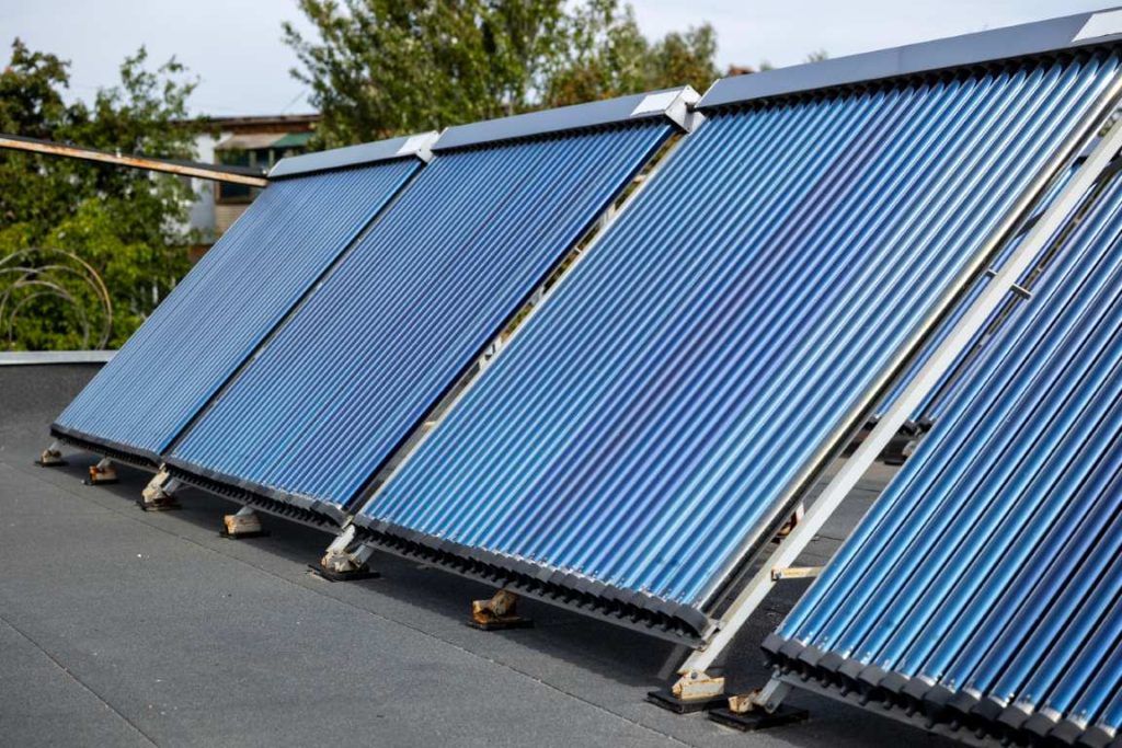 А Solar Water Heating Collectors, Equipped With Blue Vacuum Tubes